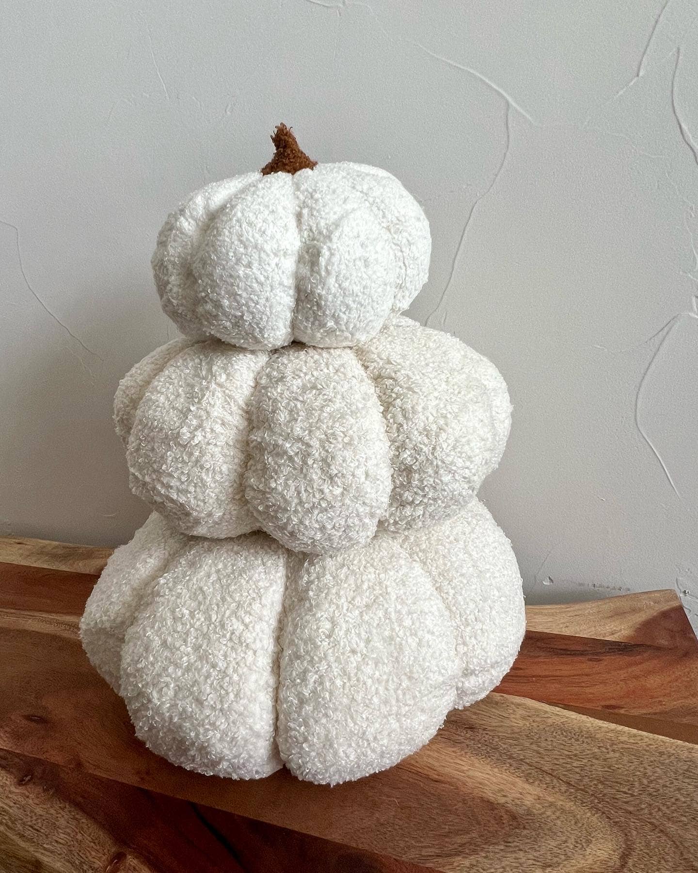 Delmar Decor pumpkin fall boucle pillow, full decorative pillow with orange and cream boucle fabric for autumn decor.