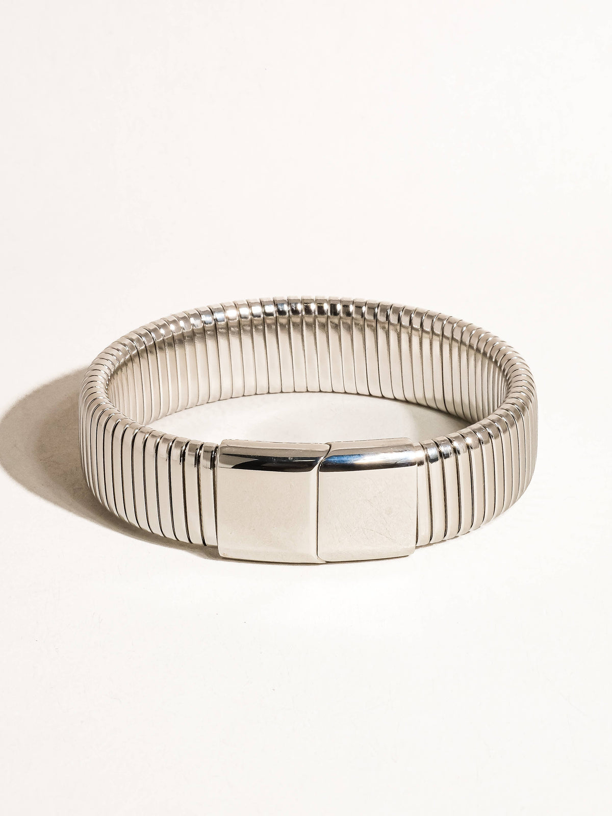 Christel 18K gold non-tarnish stripe bold bangle by Flanerie by MAIQ, featuring a sleek gold finish and modern striped design.
