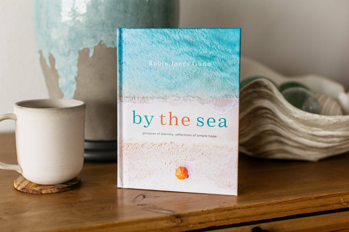 Hardcover "By the Sea" book by Harvest House Publishers, featuring seaside-themed cover artwork.