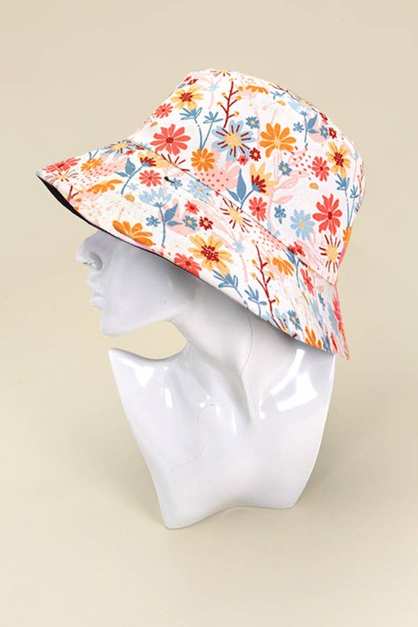 JOSSLYN floral bucket hat with colorful flower pattern, wide brim, and casual style, perfect for sunny weather.