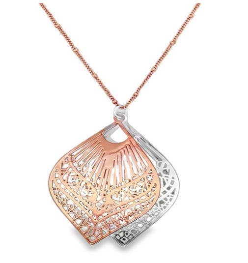 Rose gold and rhodium necklace by S & A Fashions featuring a delicate chain with a polished pendant.