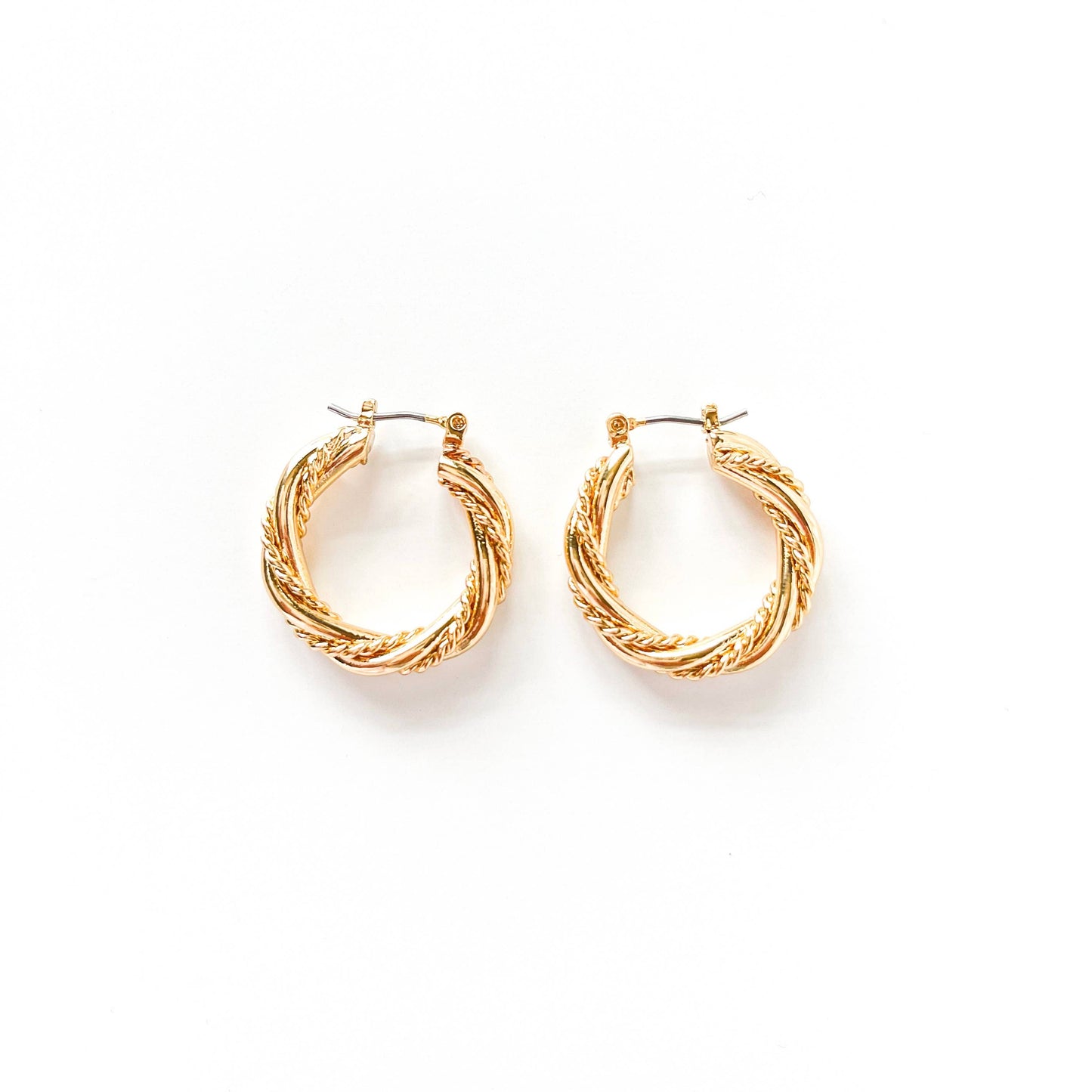 S&A Fashions twisted solid and rope hoop earrings in gold, featuring a stylish intertwined design for a bold jewelry look