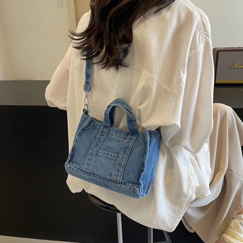 Salina Trading Inc denim handbag with sturdy handles and stylish design, perfect for casual or everyday use.