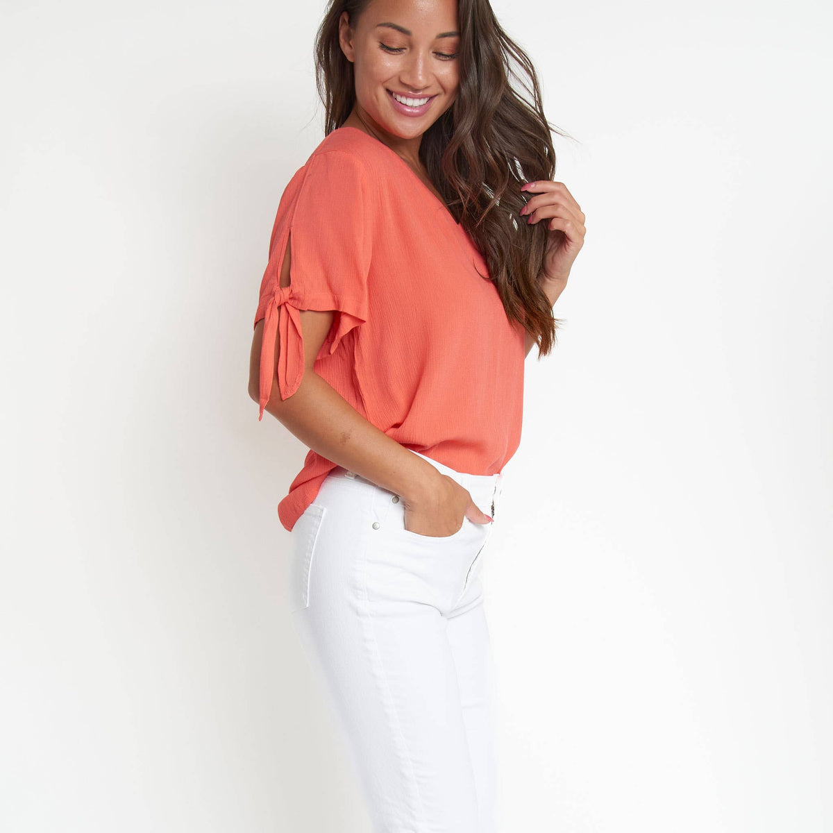 Elsie & Zoey Nika Crepe V-Neck Short Sleeve Blouse with tied front, lightweight fabric, and relaxed fit.