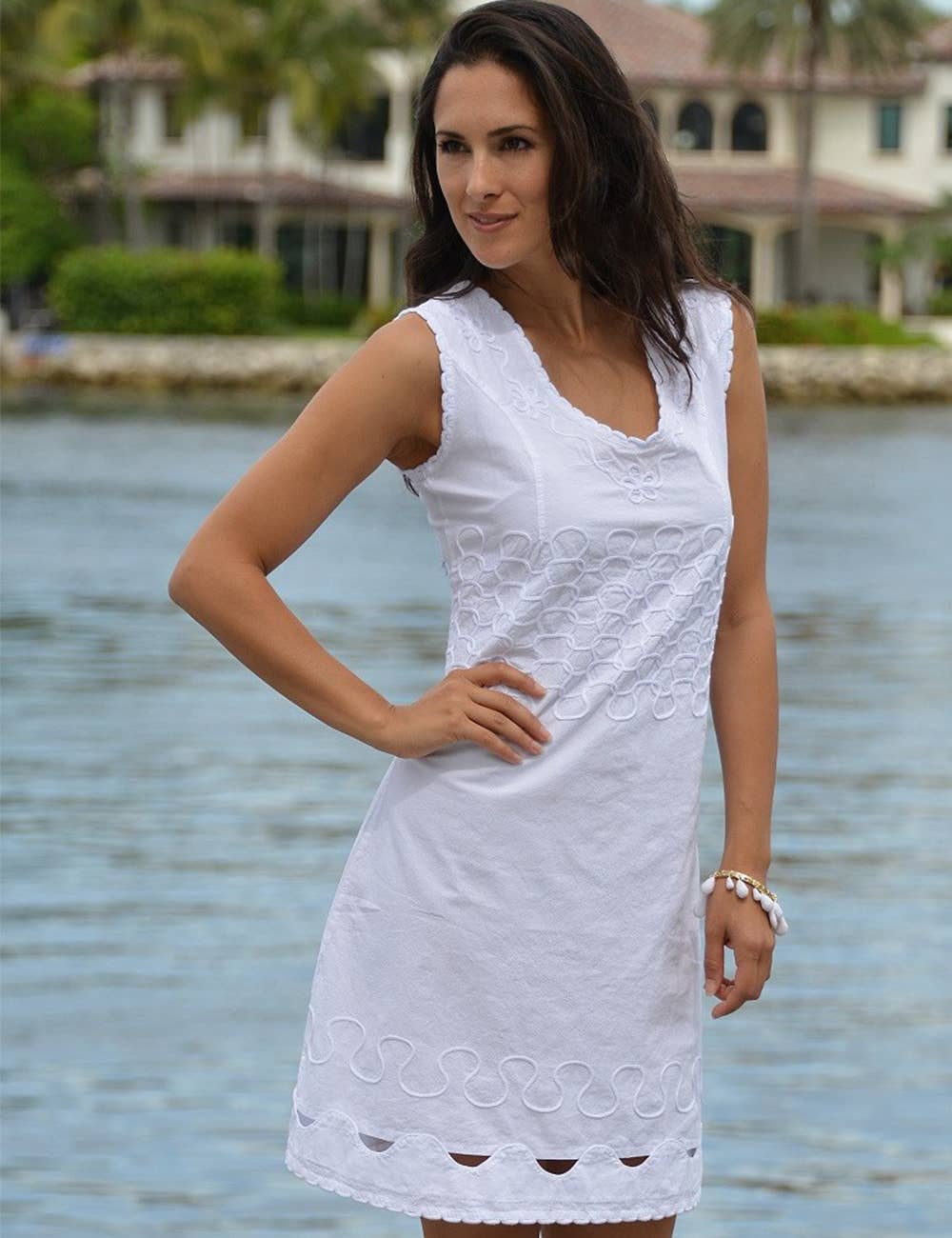 Cotton Natural Largo Dress shown on a hanger, featuring a flowy fabric and casual style perfect for everyday wear.