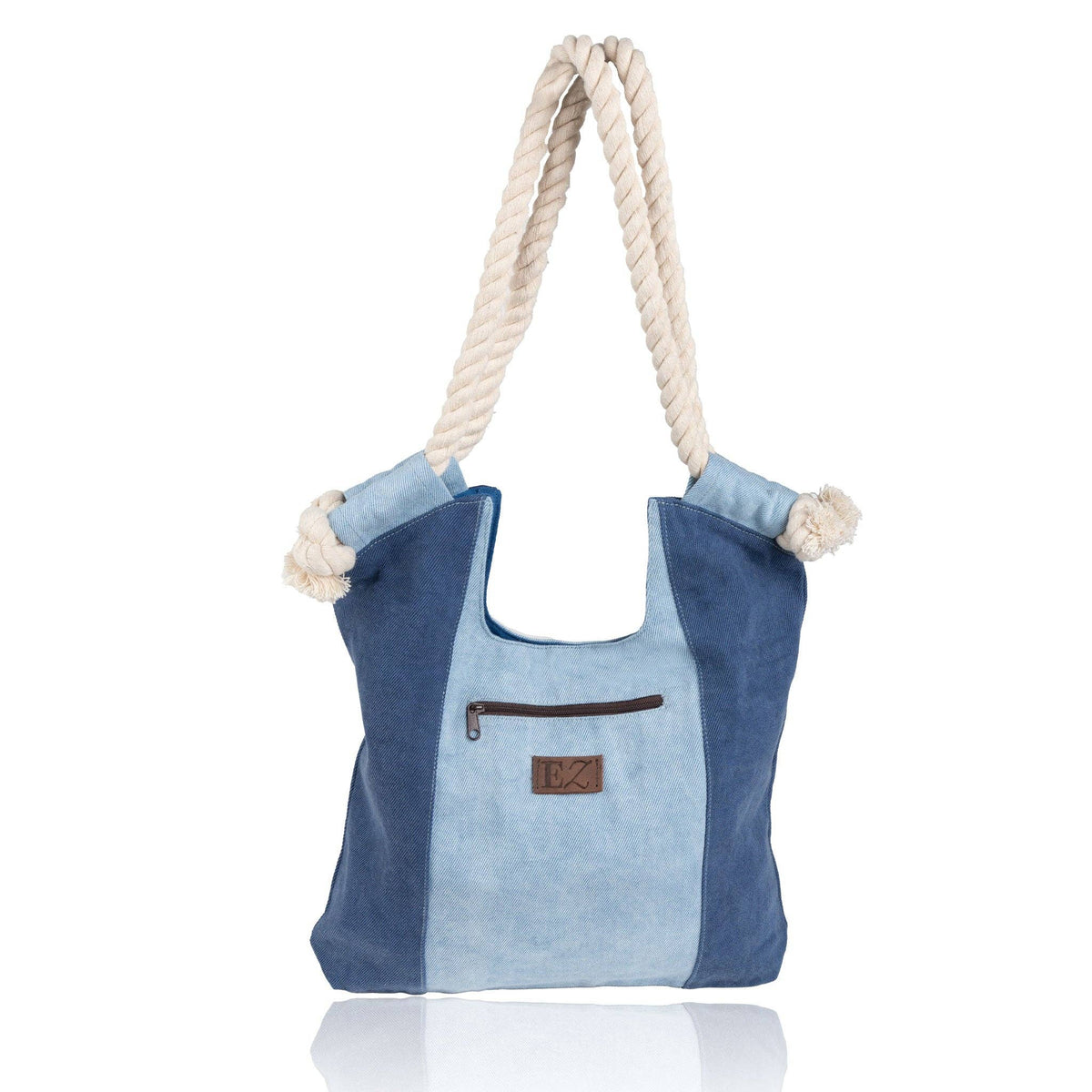 Howard's Nikole Patchwork Denim Handbag with top handle and patchwork design, showcasing textured denim material and stylish craftsmanship.