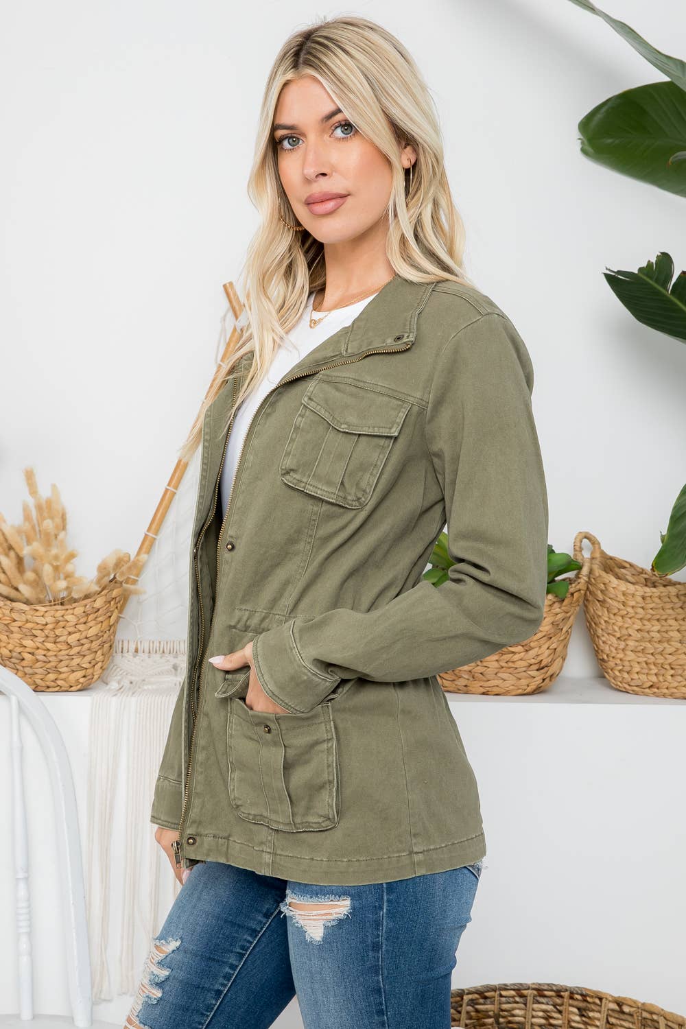 Heavy twill garment washed Anorak jacket by 26 International, shown in olive green with front zipper and adjustable hood.