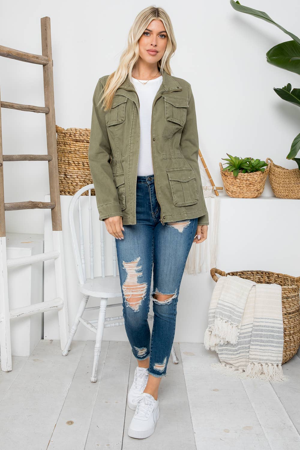 Heavy twill garment washed anorak jacket by 26 International, shown in olive green with front zipper and adjustable hood.