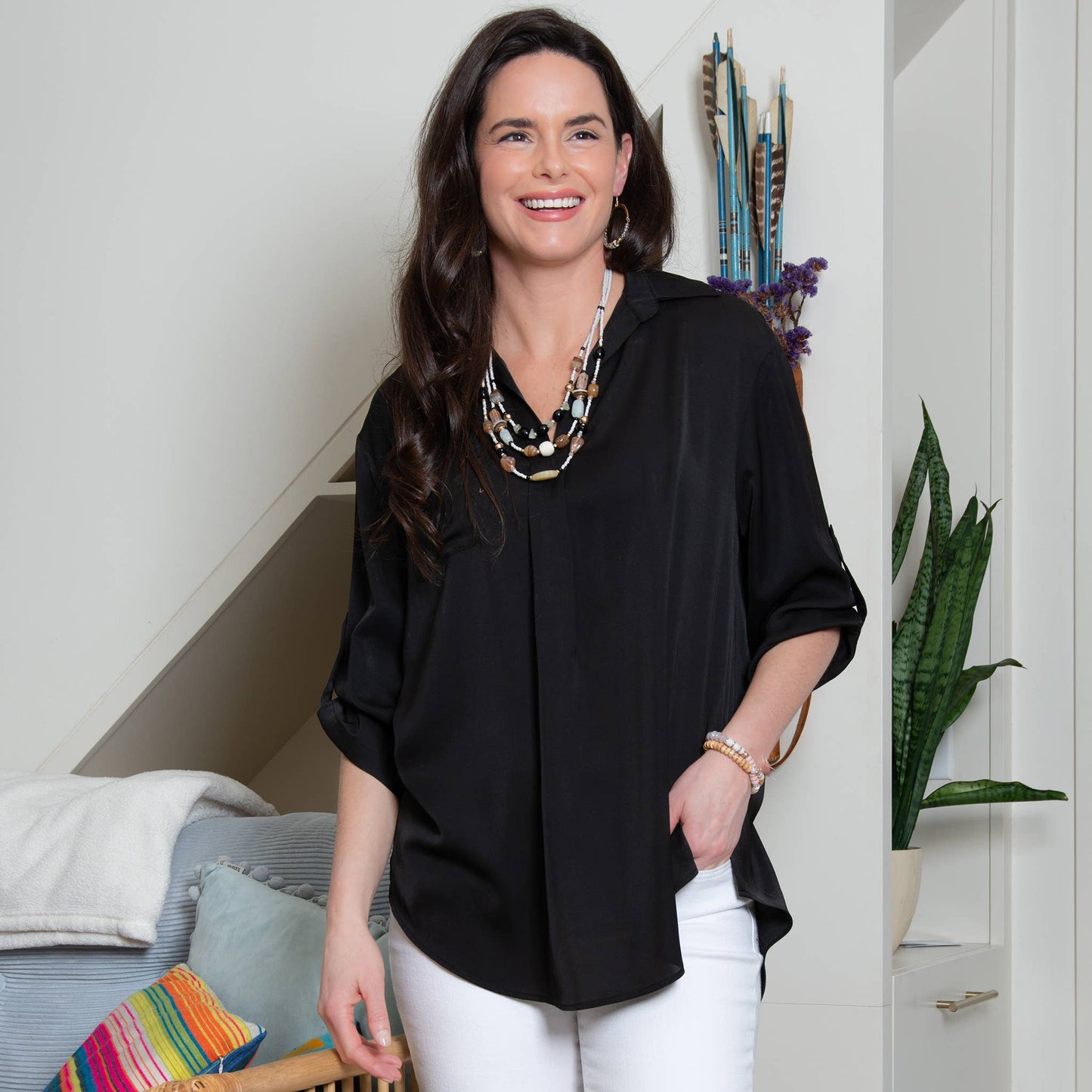 Elsie & Zoey blouse top with collared neckline, relaxed fit, half sleeves, and V-neck style. Light-colored, casual women's top.