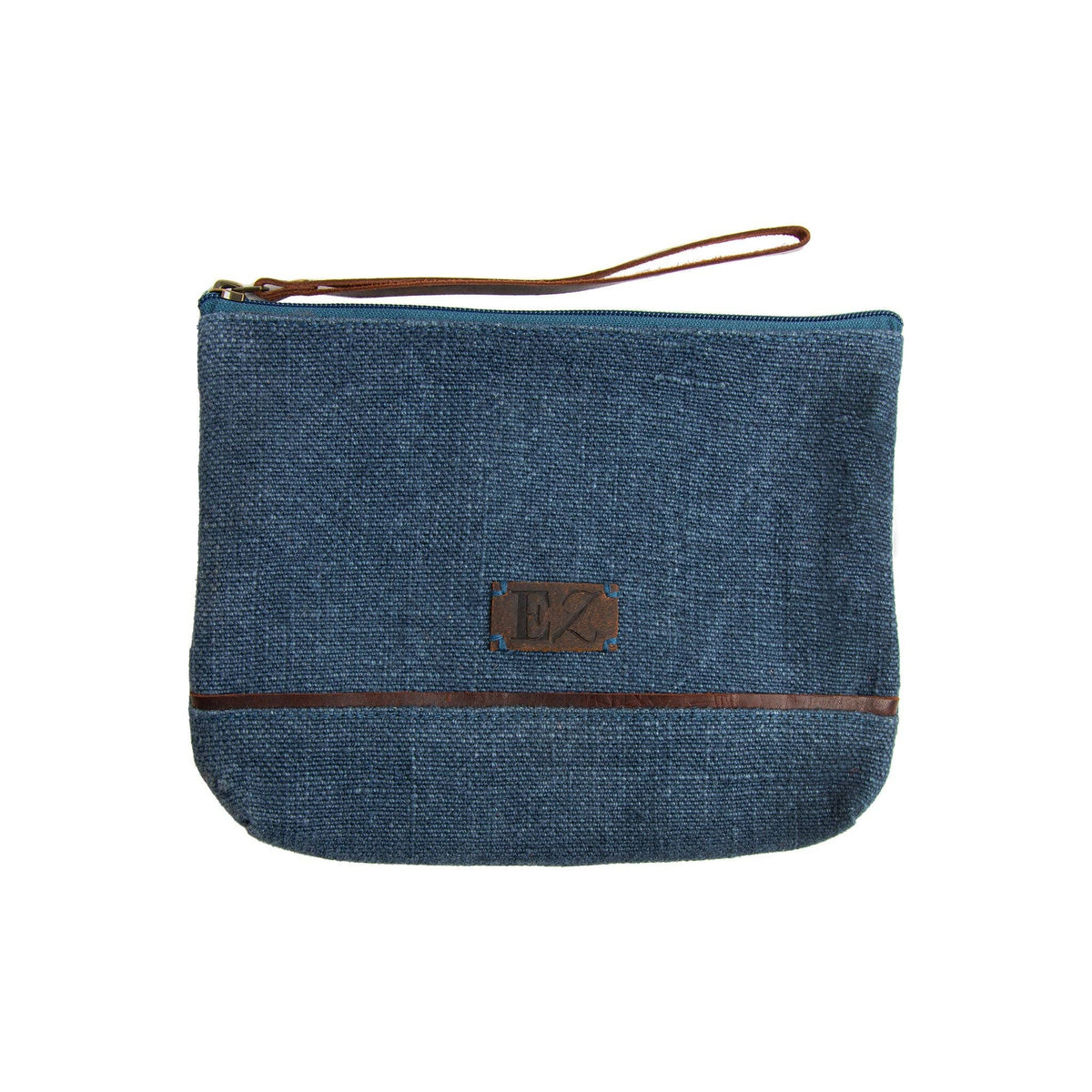 Blue denim pouch with brown zipper and strap on a white background