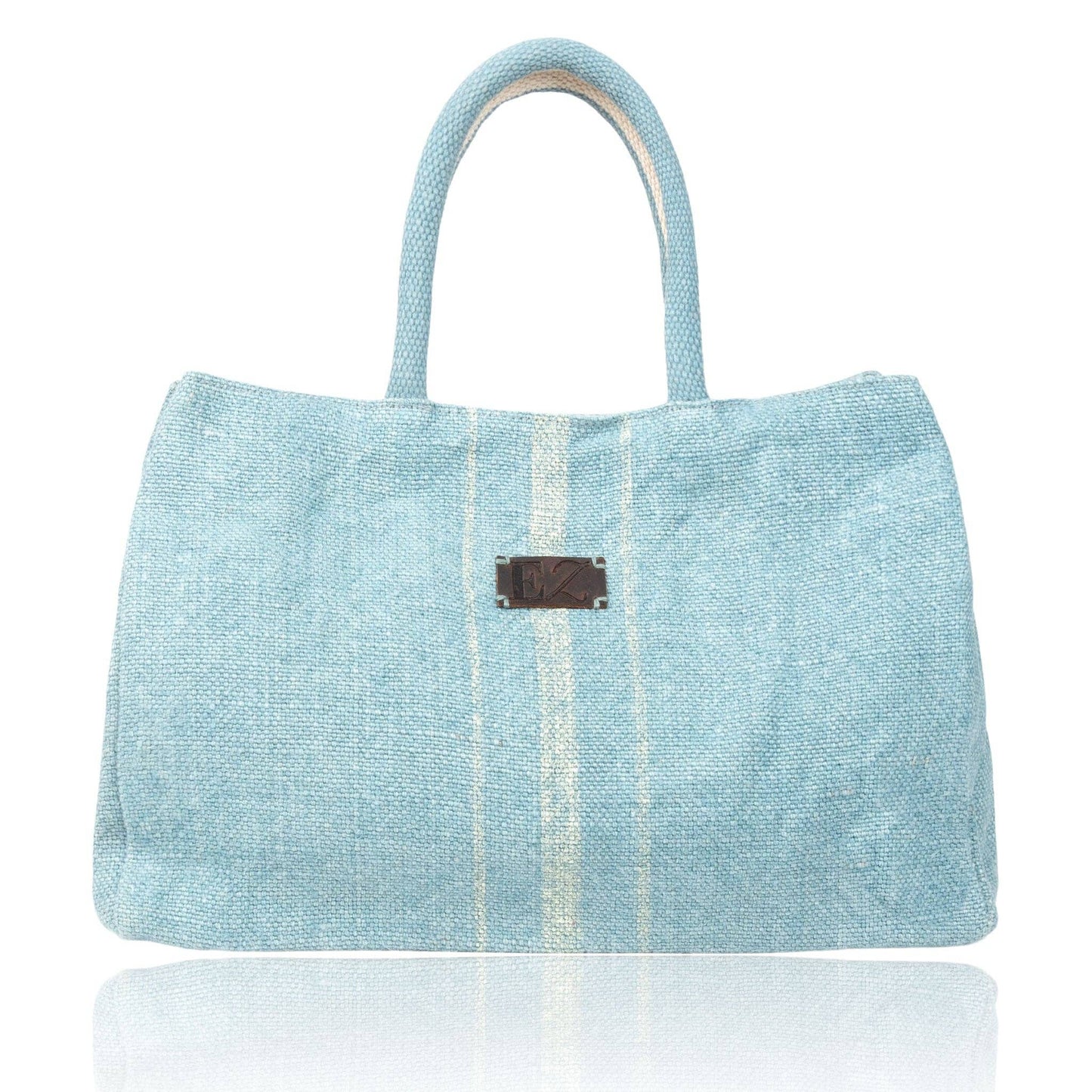 Inara Jute Handled Tote Bag with snap closure by Howard's, featuring natural jute material and stylish design.