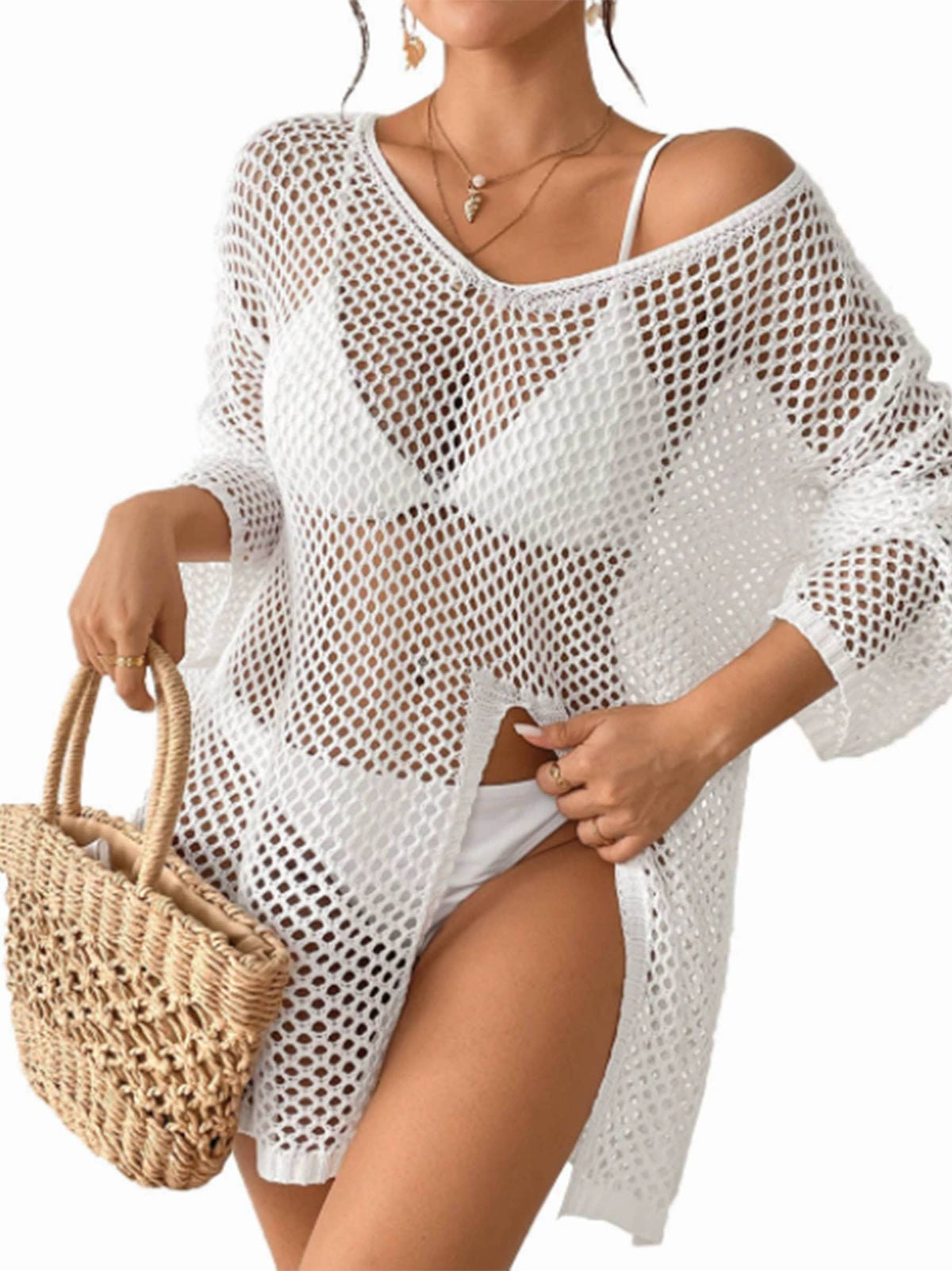 Hollow slit long-sleeved beach dress by Wholesalesir, lightweight fabric with a stylish slit design, perfect for seaside wear.