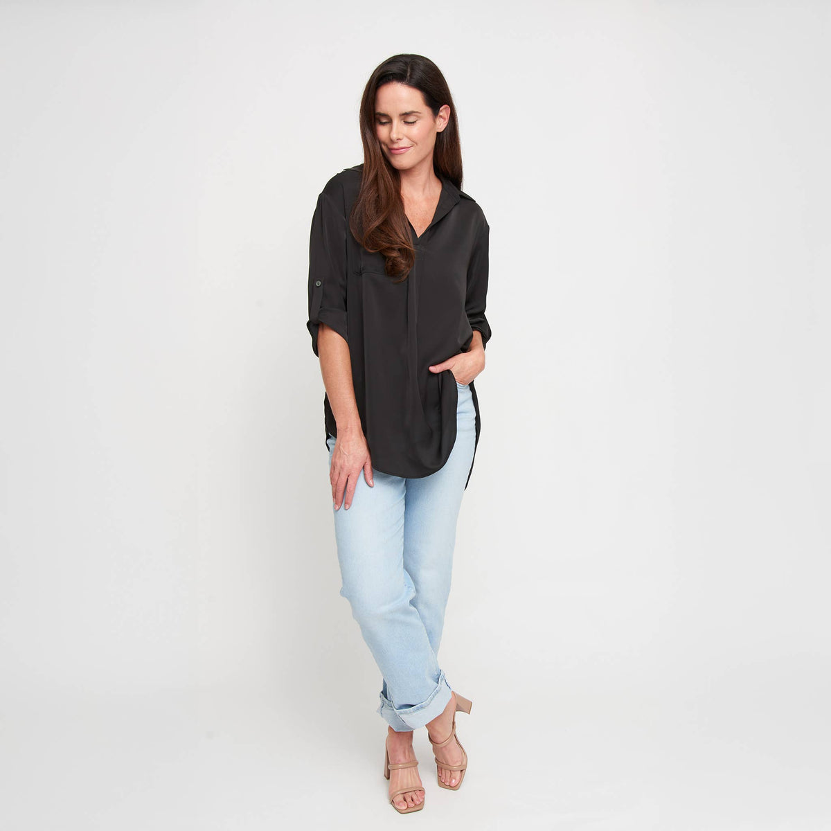 Elsie & Zoey Amaris blouse top with collared neckline, relaxed fit, half sleeves, and V-neck style, shown on a model.