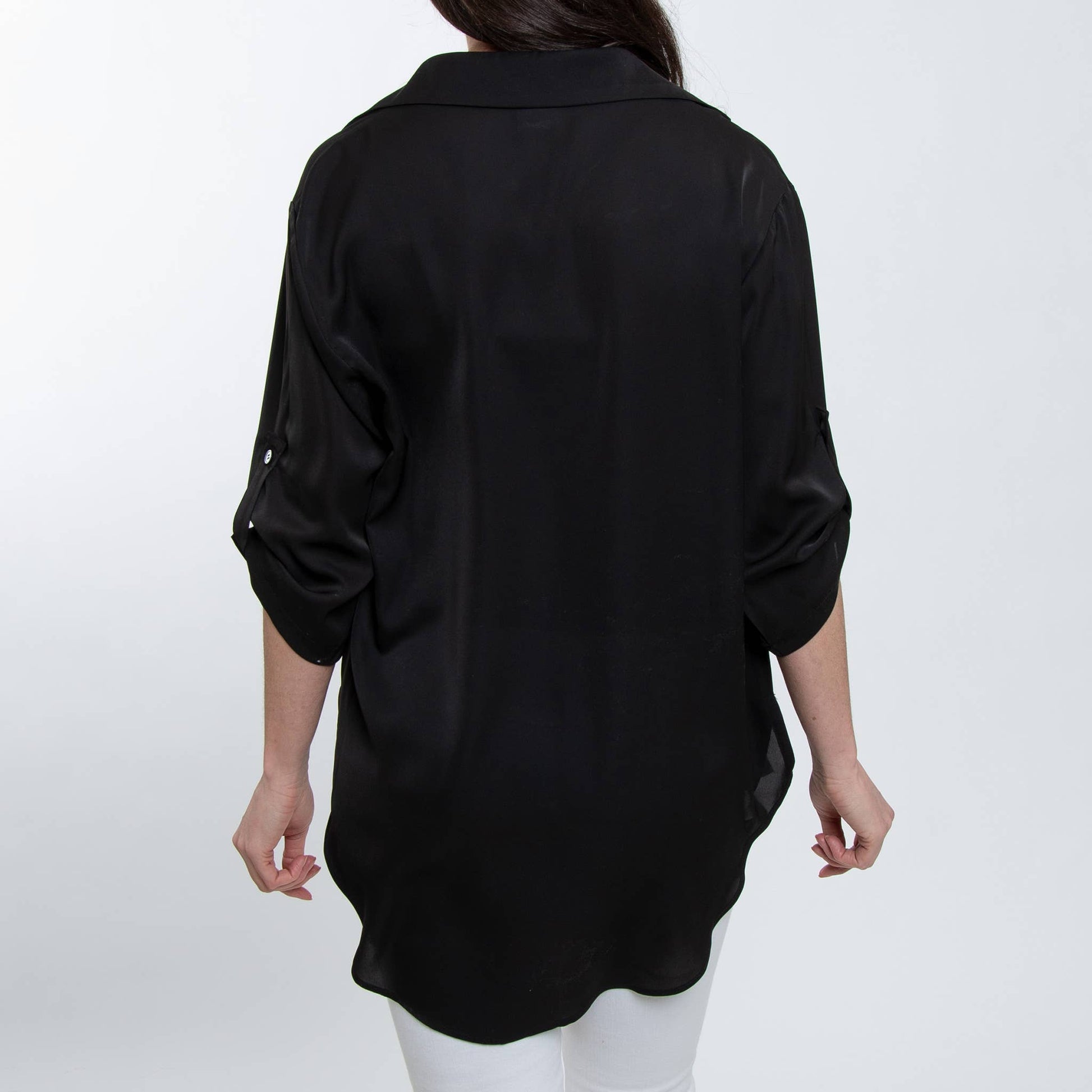 Elsie & Zoey blouse top with collared V-neck, relaxed fit, half sleeves, in soft fabric, styled on a hanger.