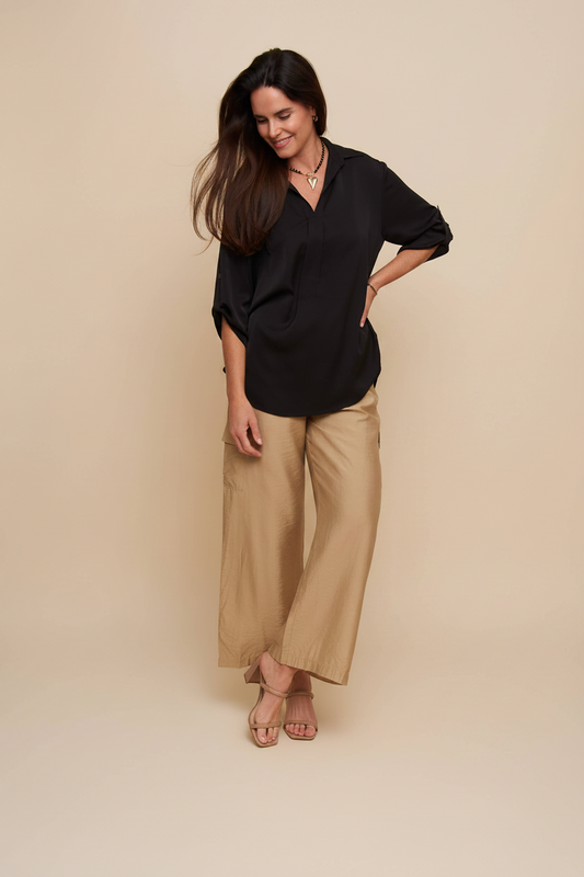 Elsie & Zoey Amaris blouse top, relaxed fit, collared with half sleeves and V-neck, shown on a model.