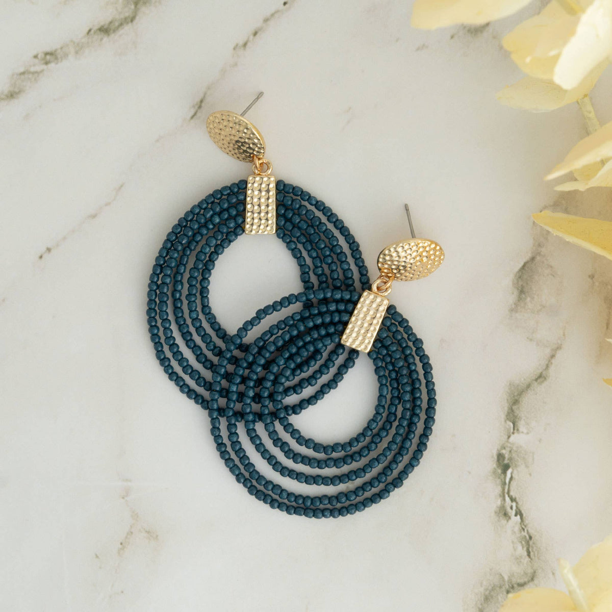 Nickel-free hoop seed bead drop earrings by Howard's featuring colorful seed beads and elegant dangling design.