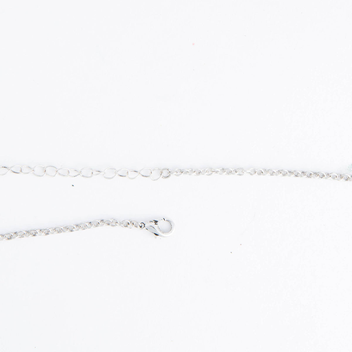 Howard's Zenni engraved antique silver butterfly pendant necklace on an 18-inch chain, featuring detailed butterfly engraving.