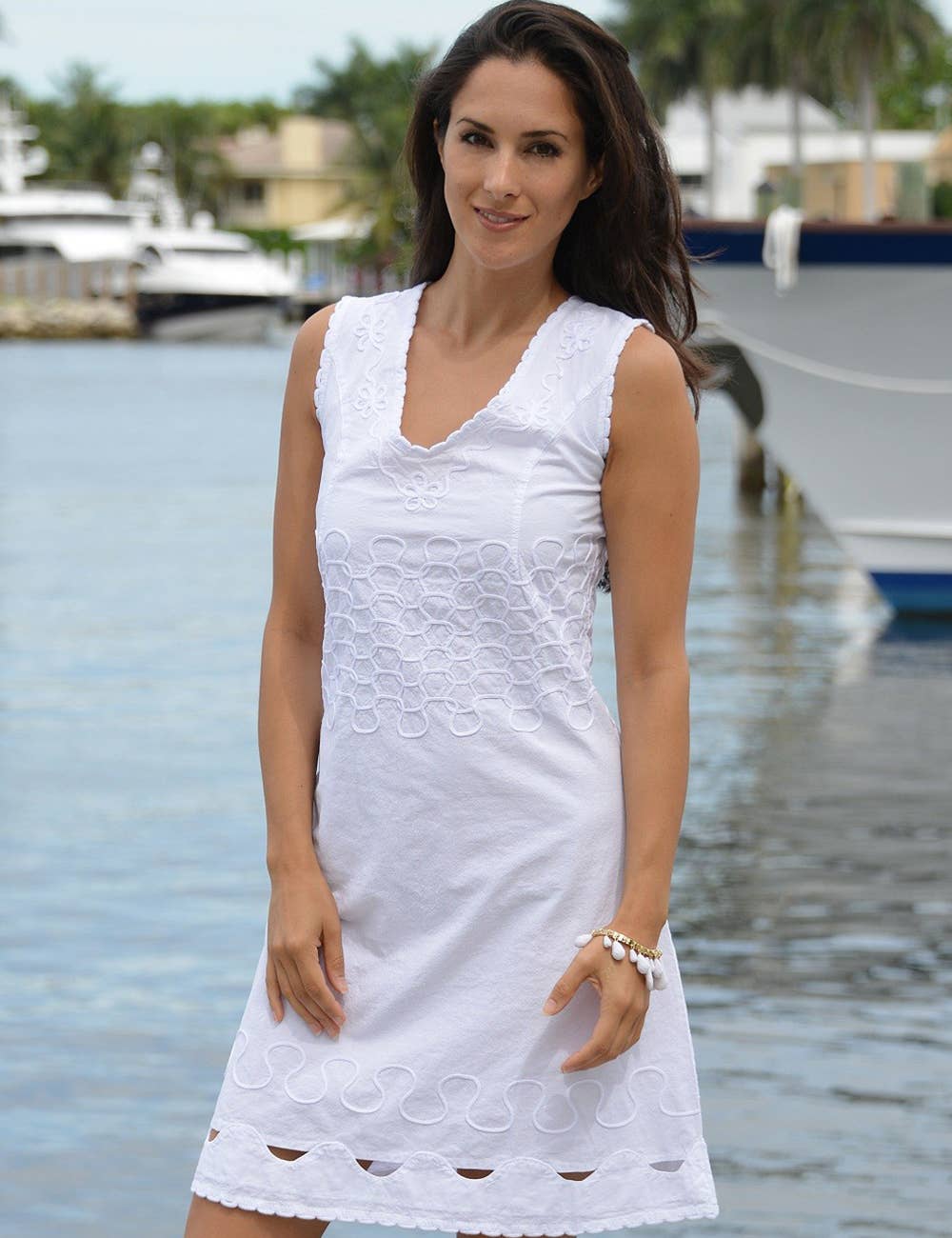 Cotton Natural Largo Dress displayed on a hanger, featuring a flowy, lightweight fabric with a relaxed fit and stylish design.