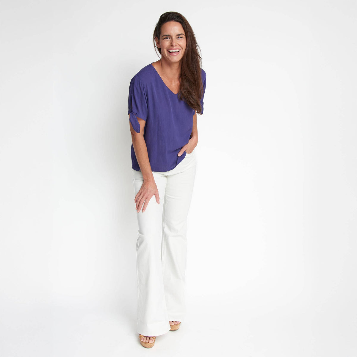 Elsie & Zoey Nika Crepe tied short sleeve V-neck blouse in soft fabric, featuring a stylish design and elegant fit.