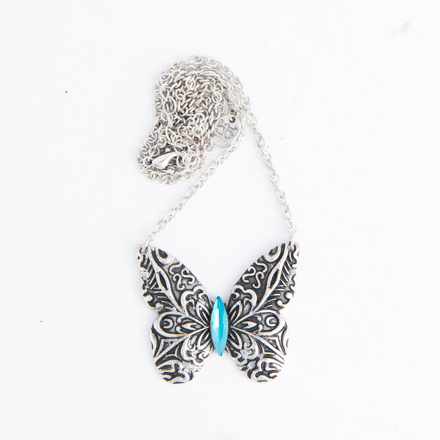 Howard's Zenni engraved antique silver butterfly pendant necklace on 18-inch chain, featuring detailed butterfly design and vintage style.
