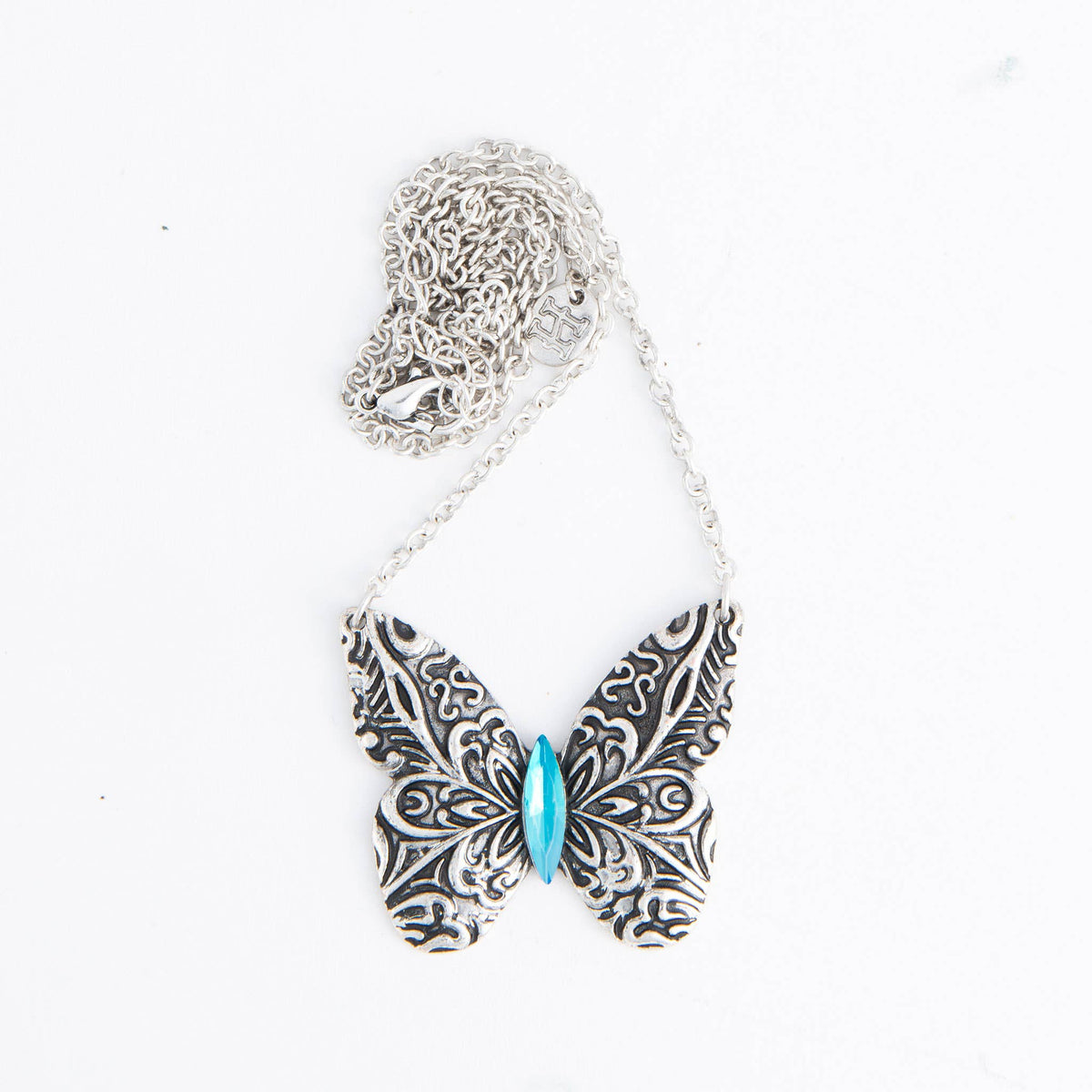 Howard's Zenni engraved antique silver butterfly pendant necklace on 18-inch chain, featuring detailed butterfly design and vintage style.