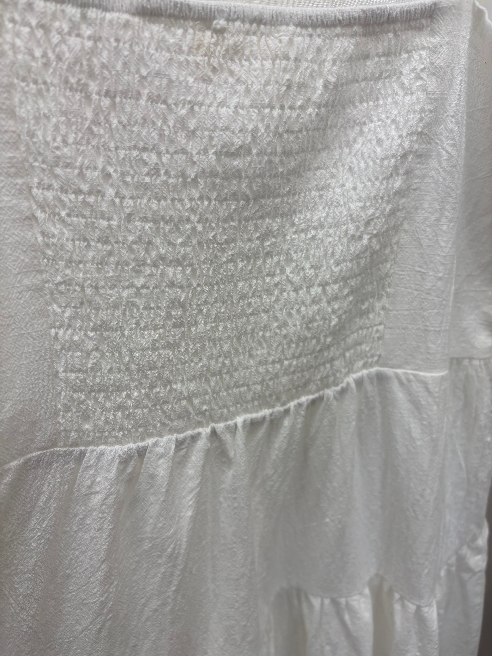 Cotton coastal sun dress by Chic Speak Boutique featuring a flowy design, lightweight fabric, and striped pattern perfect for summer.
