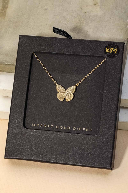 Gold dipped butterfly pendant necklace by Anarchy Street featuring a delicate butterfly charm on a fine chain.