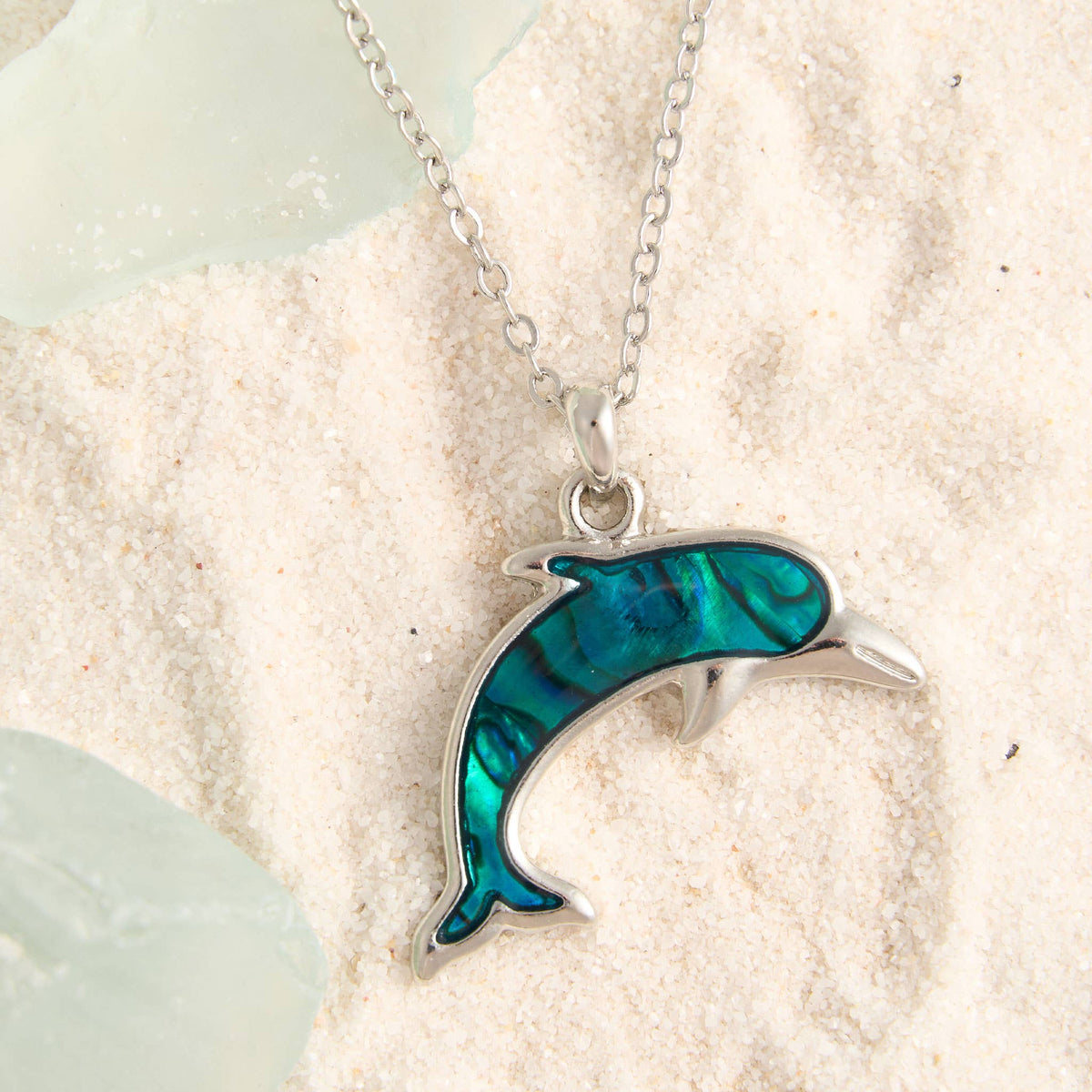 Abalone shell dolphin pendant necklace featuring a colorful dolphin design, beach jewelry style, by Howard's.