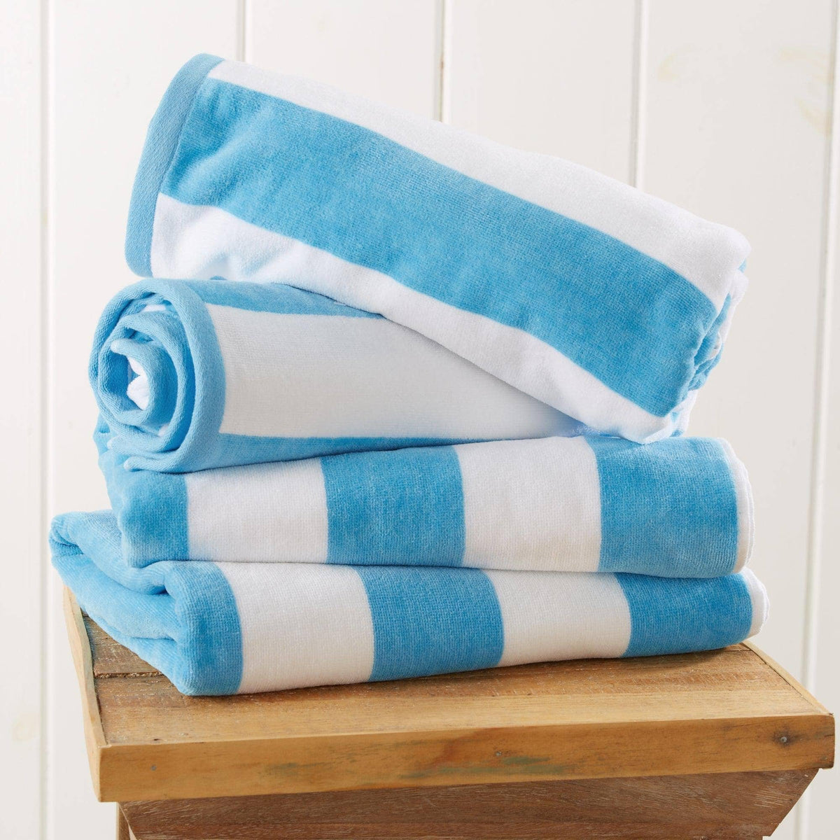 Air Blue cotton velour cabana stripe beach towel from BH Collective Novia Collection, oversized 35" x 70" with bold stripe pattern.