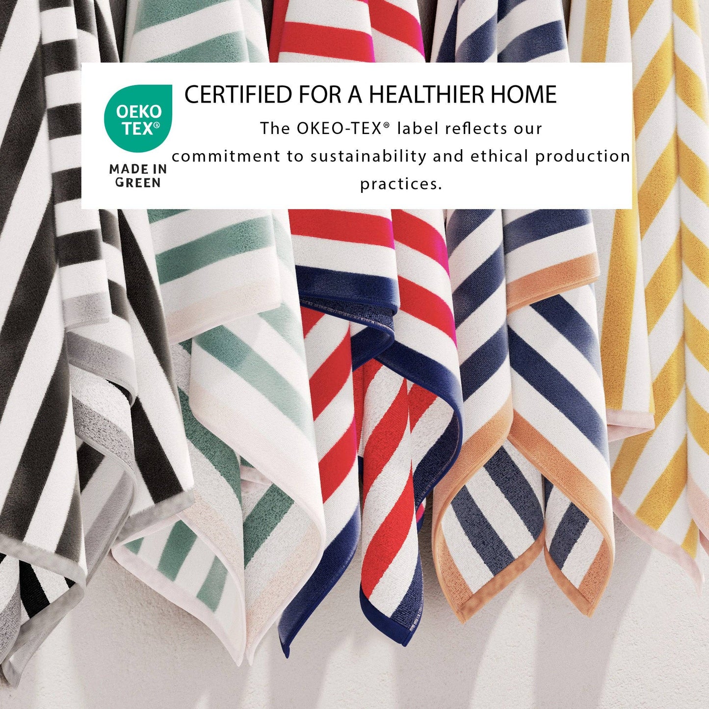 Oversized Santa Cruz striped border cabana beach towel by BH Collective, featuring colorful, soft cotton fabric for beach lounging.