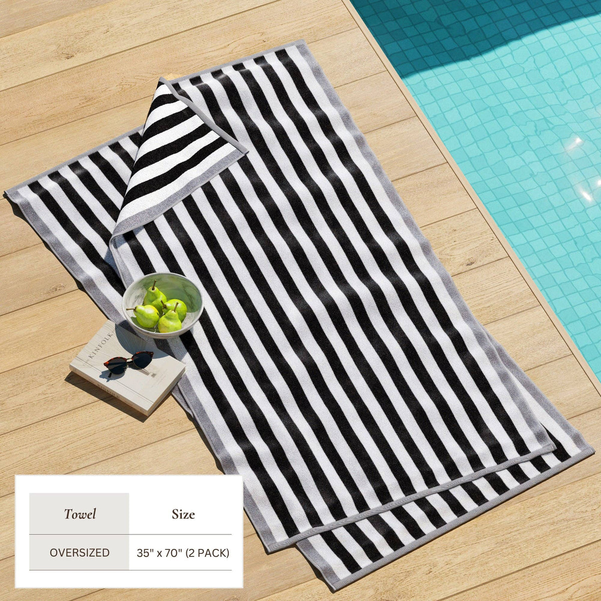 Oversized Santa Cruz striped border cabana beach towel by BH Collective, featuring vibrant beach-ready design and soft, absorbent fabric.