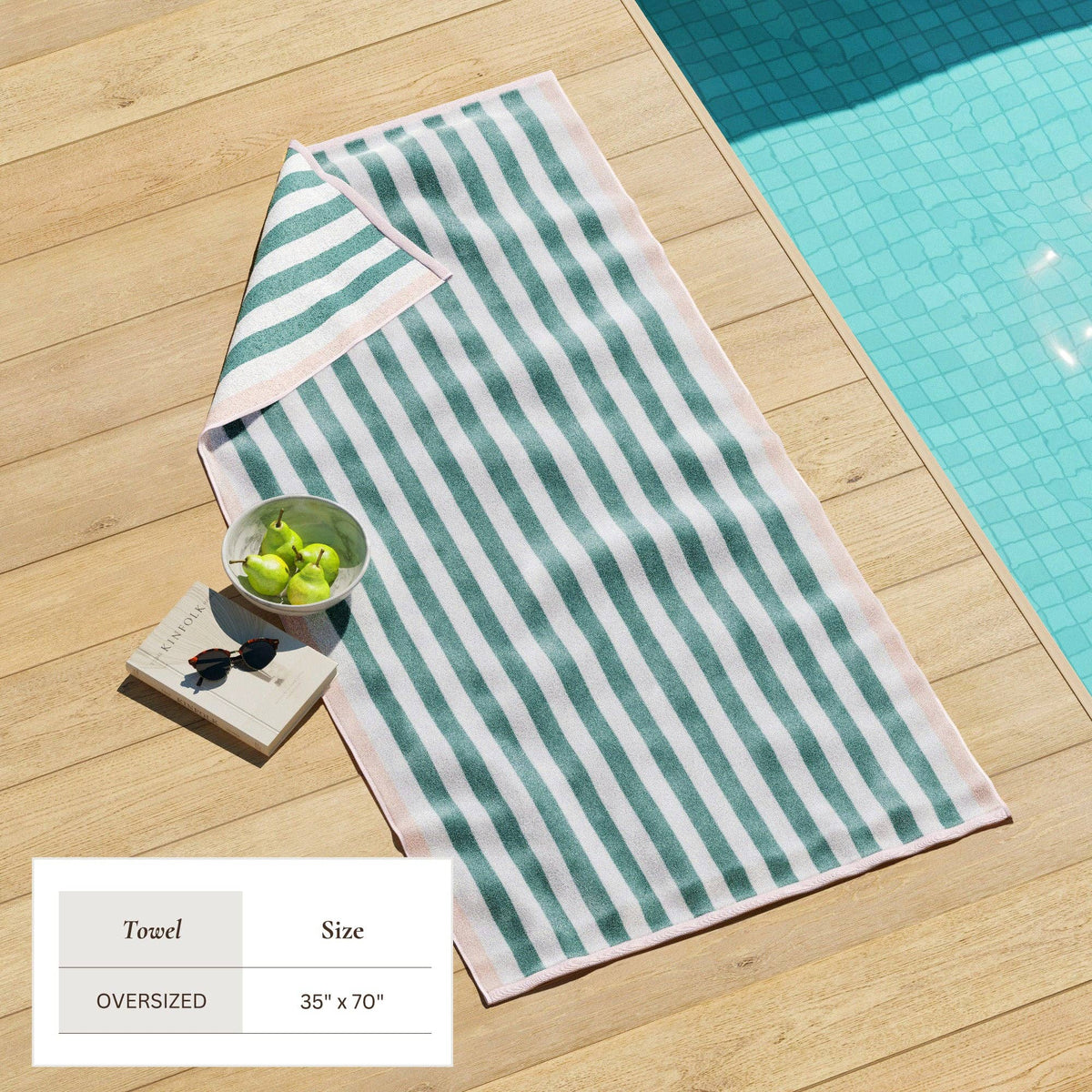 Oversized Santa Cruz striped border cabana beach towel by BH Collective, featuring colorful horizontal stripes and a soft, plush fabric.