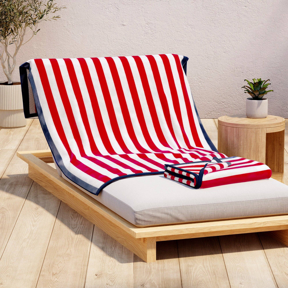 Oversized striped border Santa Cruz beach towel by BH Collective, featuring vibrant colors and soft, absorbent fabric.