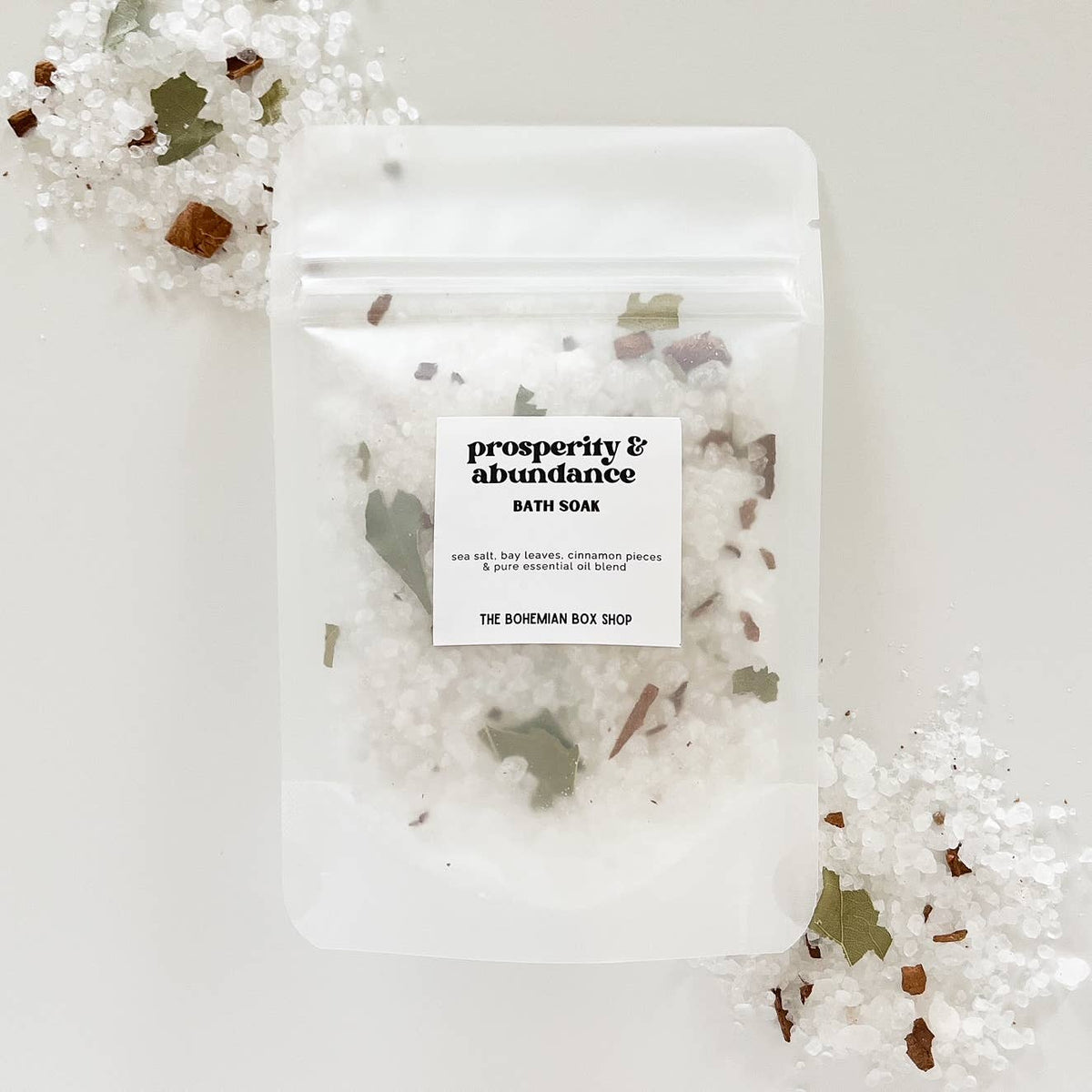 Bohemian Box Shop prosperity and abundance bath soak in a 2oz or 4oz jar, featuring colorful bath salts for relaxing self-care.