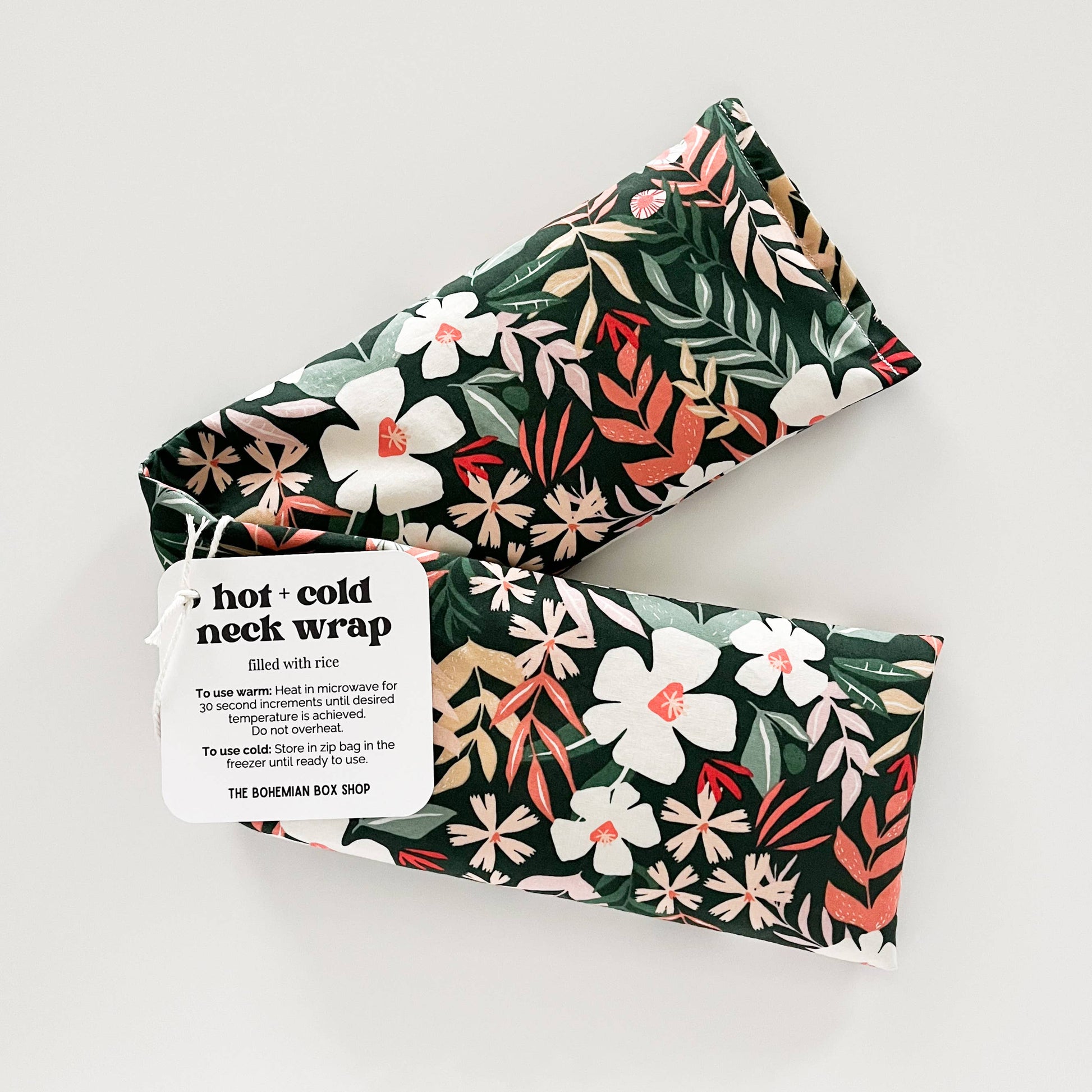 Bohemian Box Shop Hot & Cold Therapy Neck Wrap featuring colorful floral patterns and soft fabric for soothing relief.