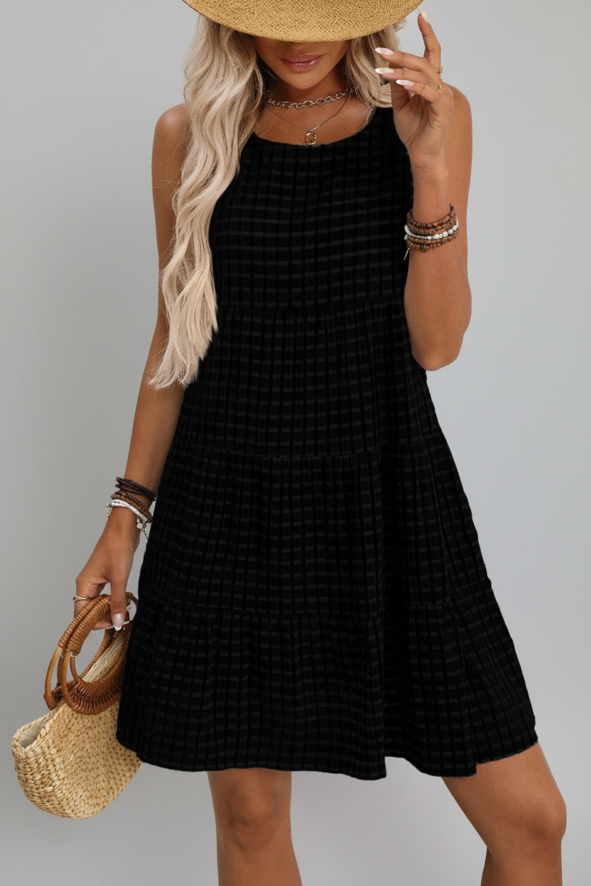 Sleeveless plaid dress by Wholesalesir featuring a classic checkered pattern and a fitted bodice, perfect for casual wear.
