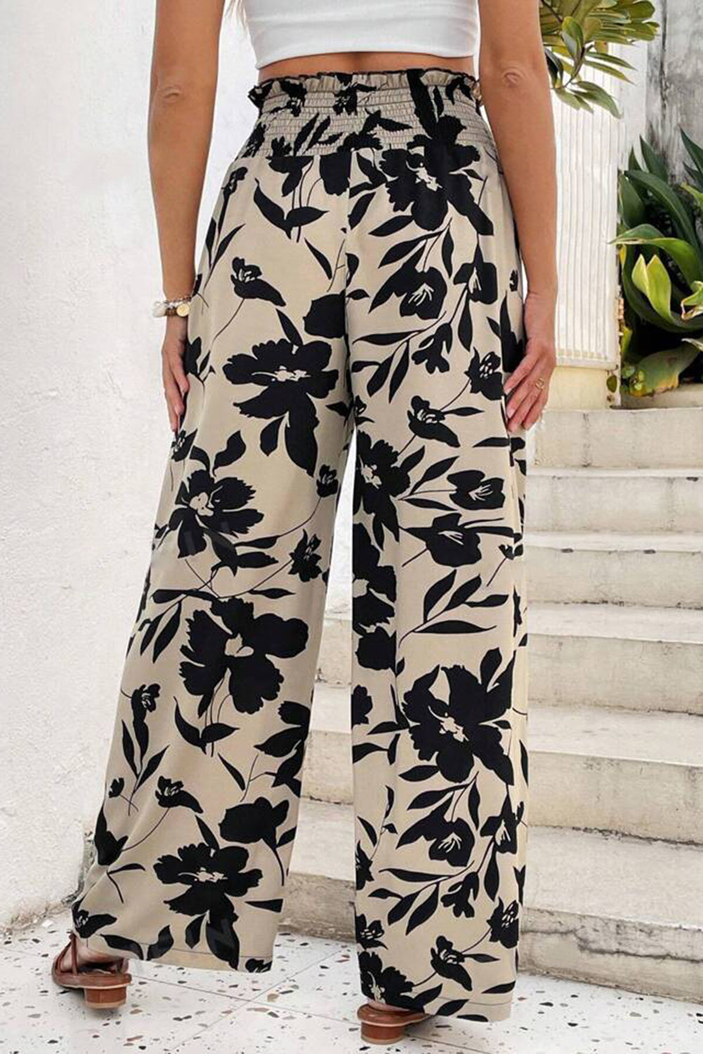 Floral pant with frill waist and wide-leg design from Chic Speak Boutique, shown in a stylish view highlighting the fabric and fit.