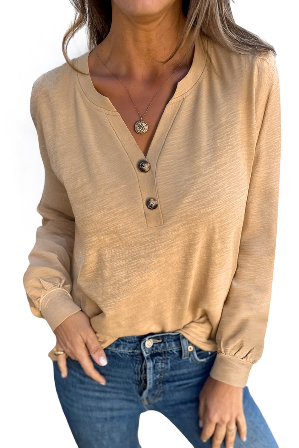 Beige long sleeve V-neck top from Chic Speak Boutique, shown flat with soft fabric and fitted design.