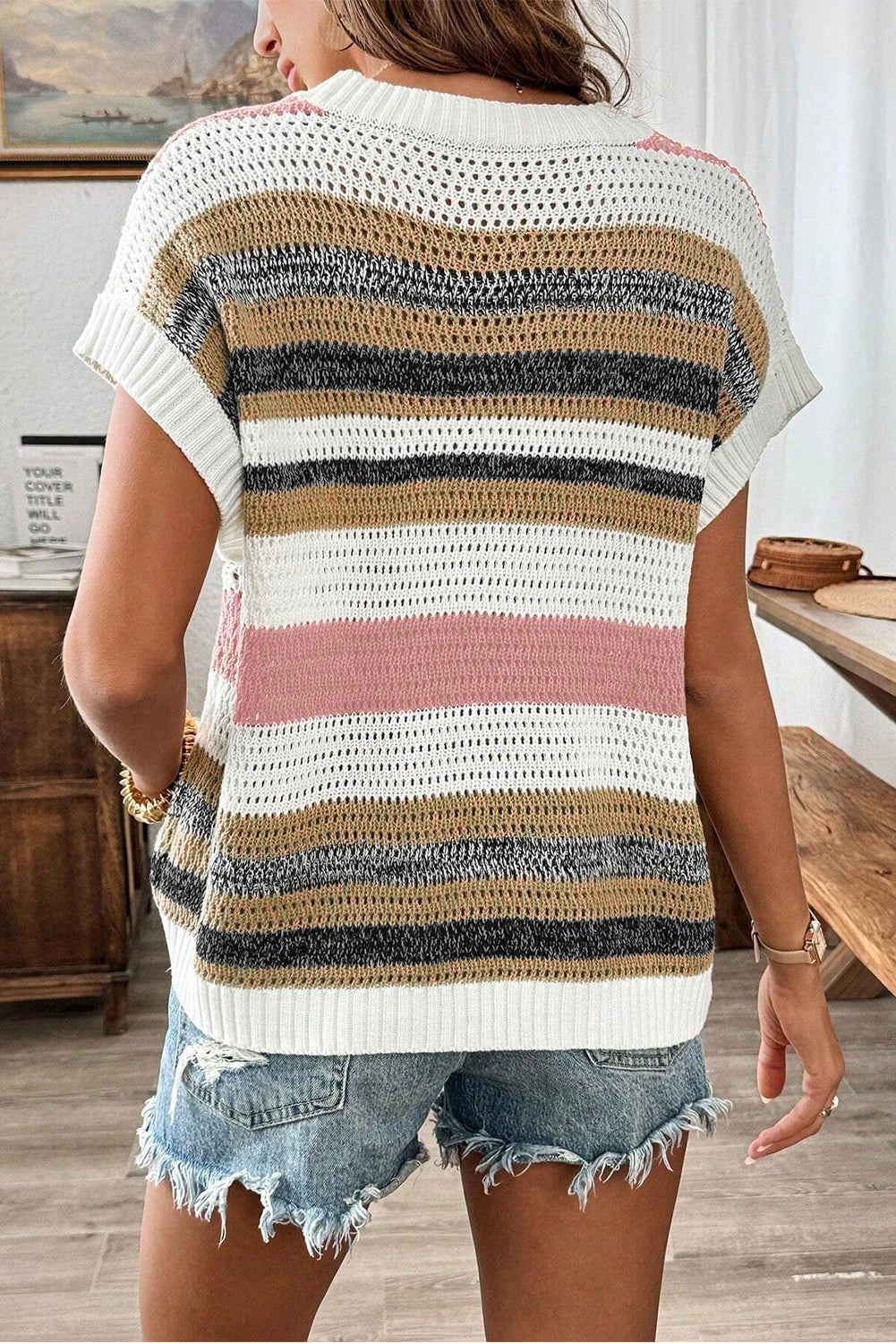 Pink stripe colorblock eyelet knit short sleeve sweater tee from Chic Speak Boutique, showing its vibrant design and textured fabric.