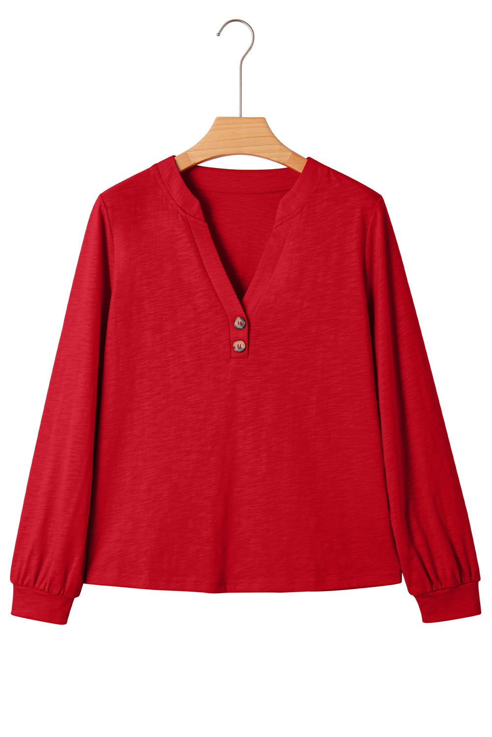 Chic Speak Boutique V-neck long sleeve top in racing red, close-up showing soft fabric and stylish fit.