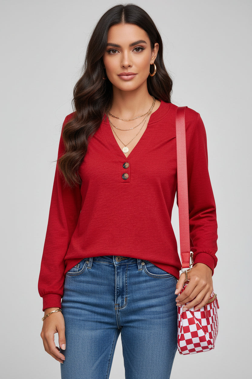 Chic Speak Boutique racing red V-neck long sleeve top displayed on a hanger with a casual fit and soft fabric.