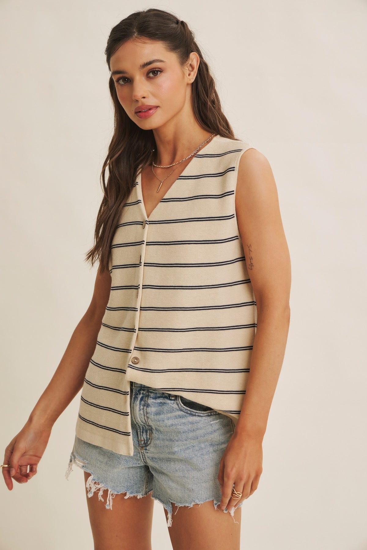 Chic Speak Boutique Bayside Leisure striped button-down sweater top featuring a relaxed fit and classic stripe pattern.