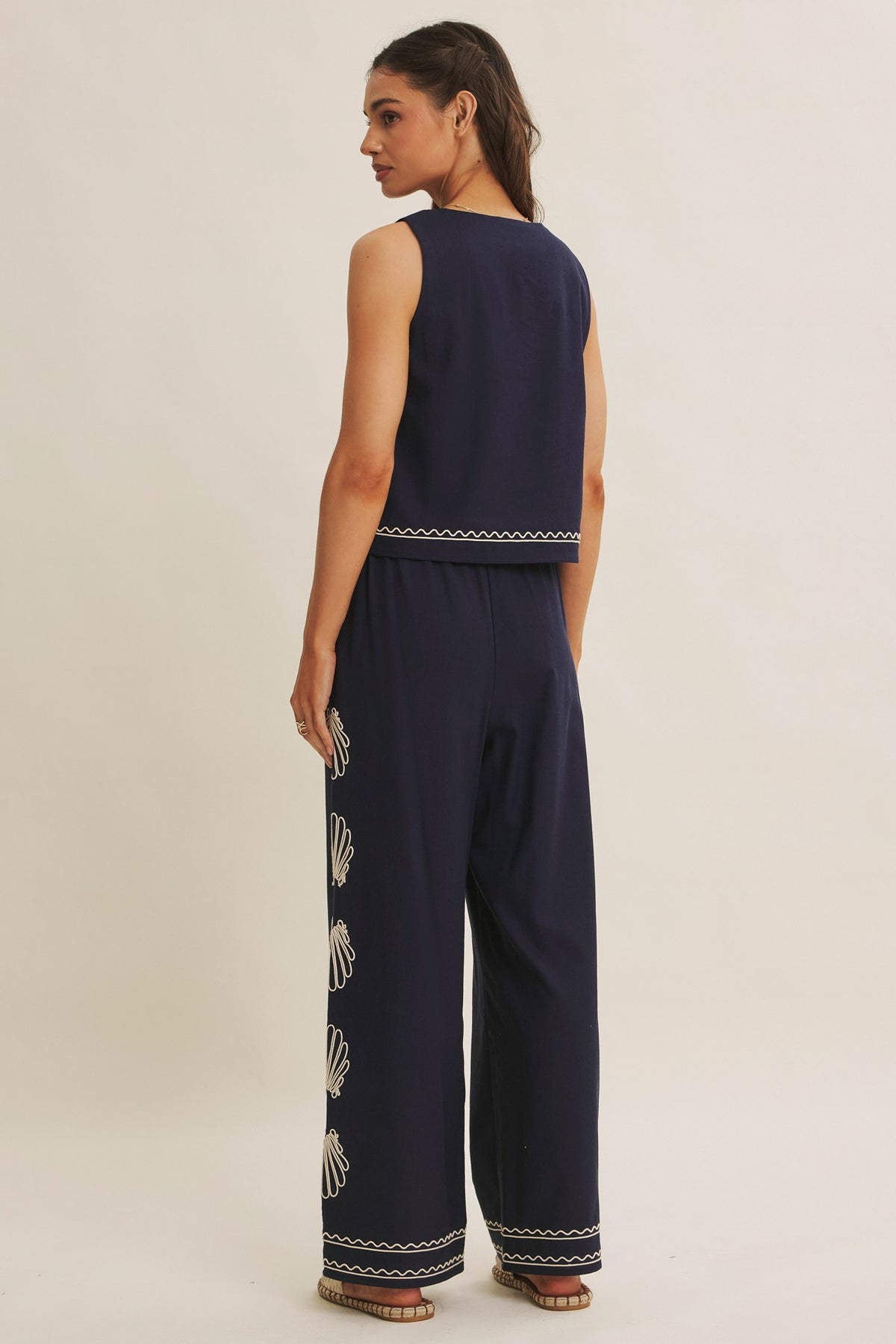 Navy seashell-embroidered square neck top by Chic Speak Boutique, featuring delicate shell details and a stylish square neckline.