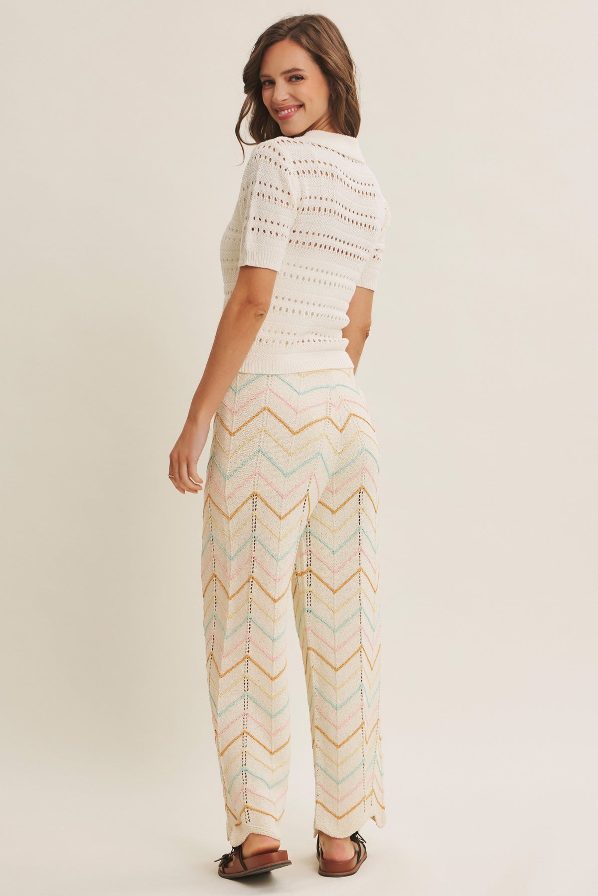 Cream split neck shear weaving pointelle sweater top by Chic Speak Boutique with textured knit and relaxed fit.