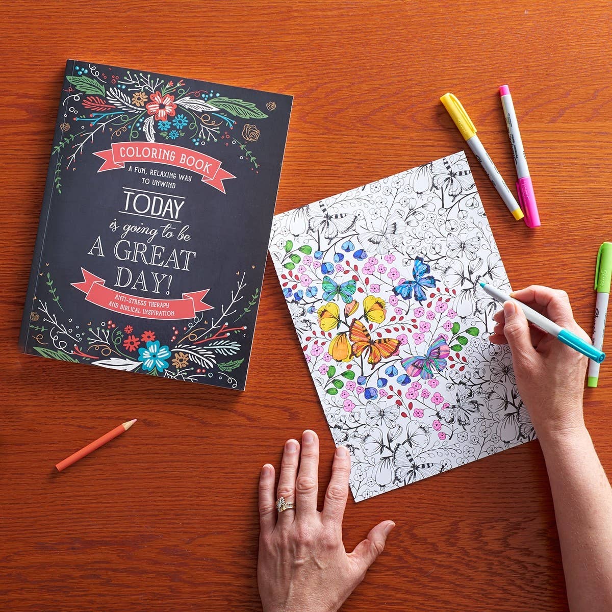 Coloring book titled "A Great Day" by Christian Art Gifts, featuring vibrant illustrations for coloring and creative fun.