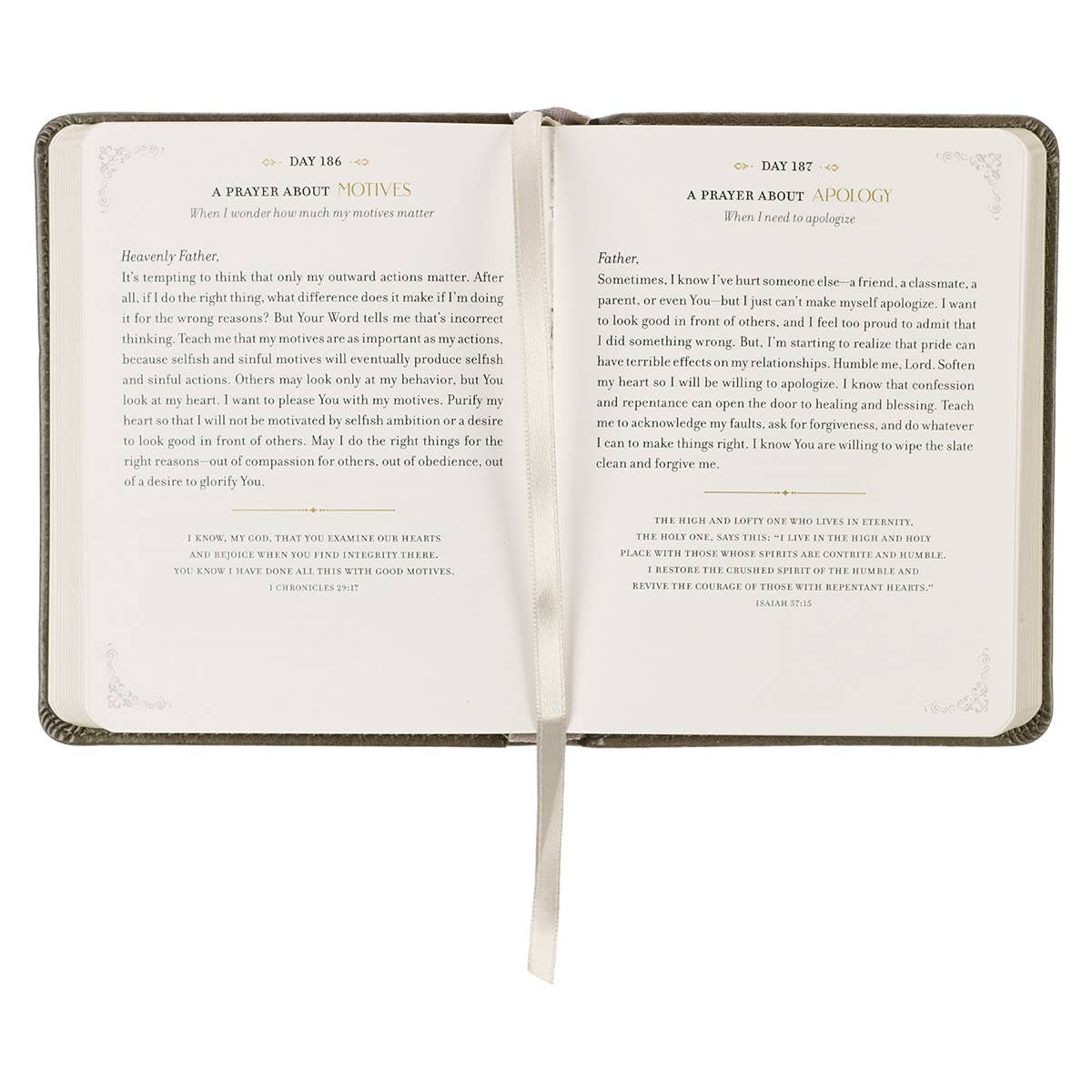 Faux leather devotional book titled "Daily Prayers for Graduates" by Christian Art Gifts, featuring gold embossed lettering on the cover.