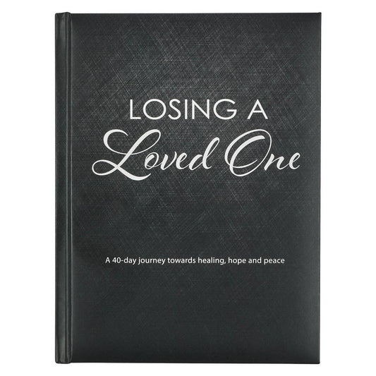 Hardcover devotional book titled "Losing A Love One" by Christian Art Gifts, featuring a serene cover design.