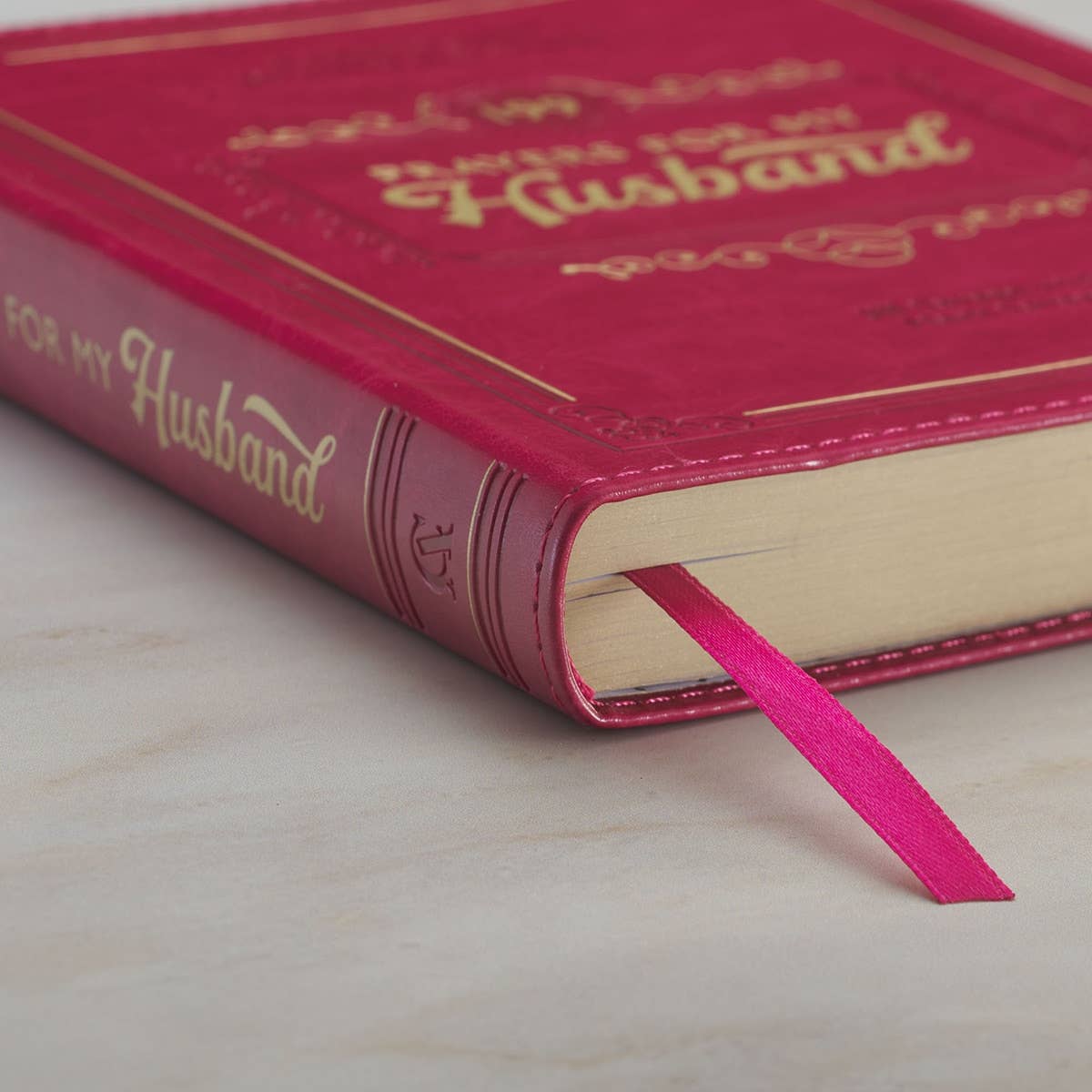 Faux leather gift book titled "199 Prayers for My Husband" by Christian Art Gifts, featuring elegant gold embossing and a decorative cover.