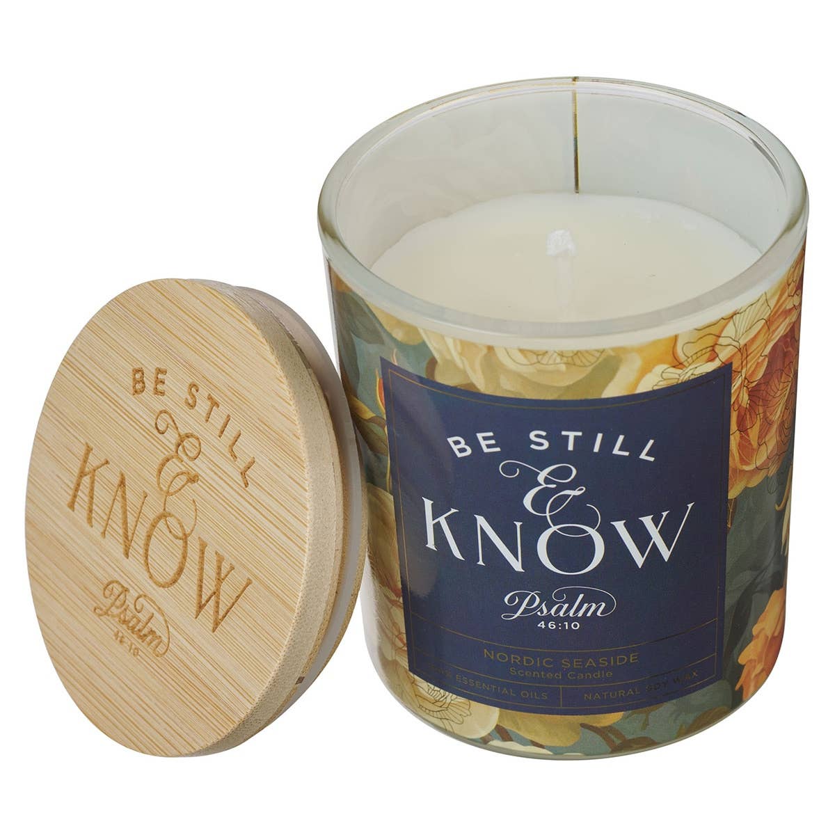 Glass candle with floral design and bamboo lid, Christian Art Gifts Be Still Ps. 46:10, featuring a serene, decorative religious motif.