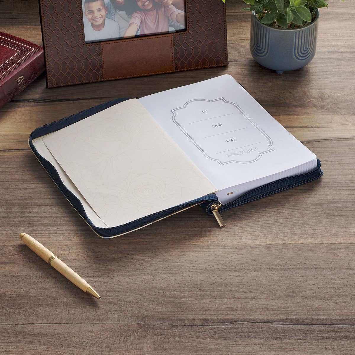 Christian Art Gifts navy classic zip journal with Psalm 46:10 inspirational quote on the cover.